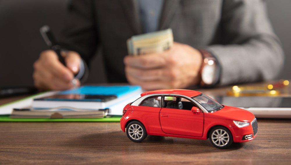 insurance-agent-signs-document-car-insurance